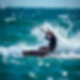 Kiteboarder riding a wave under dynamic wind conditions