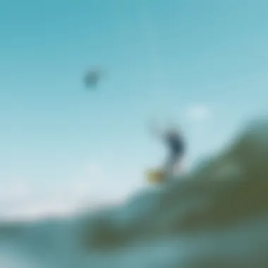 A kiteboarder riding on the water with clear skies and favorable winds